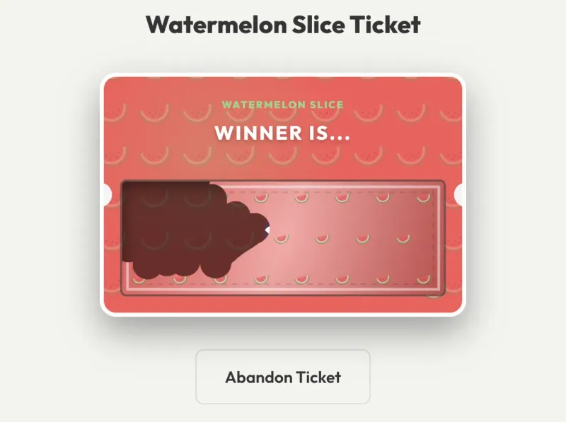 Scratch ticket being scratched on SpinAName to reveal a winner name